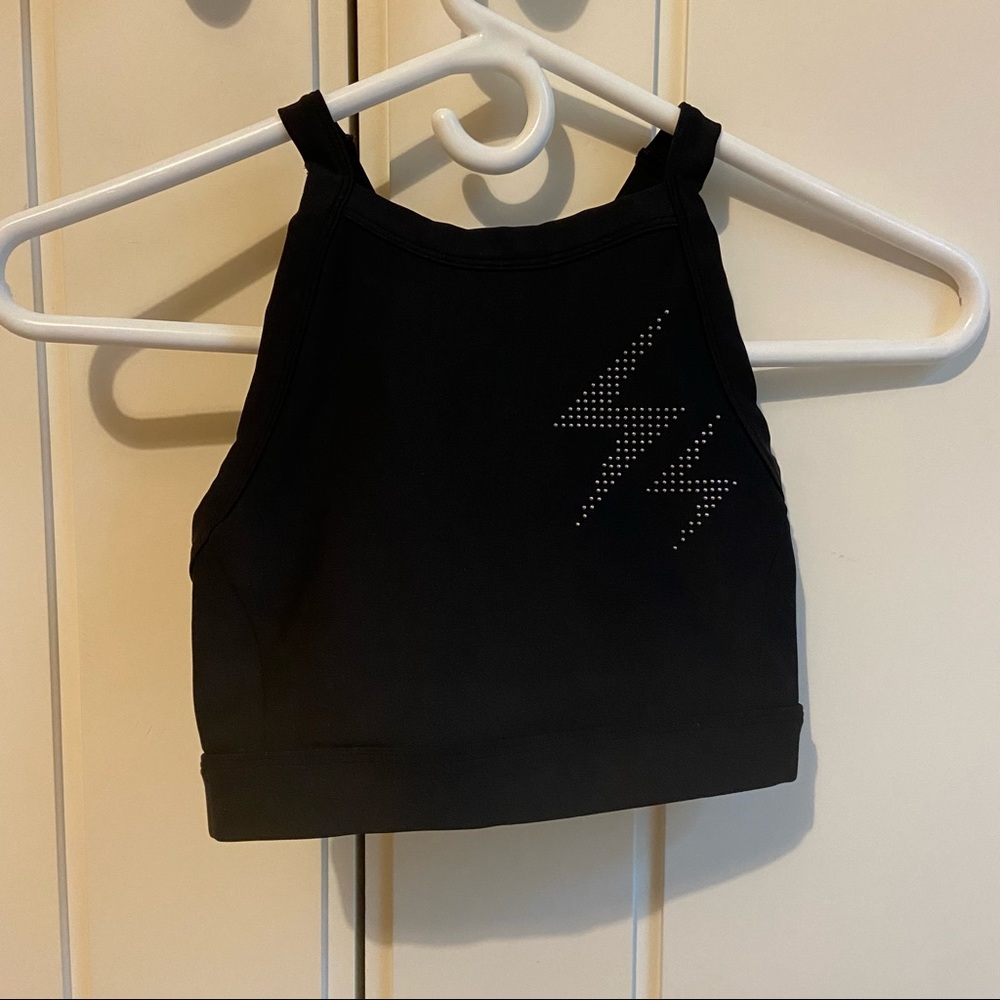 Black high neck Soulcycle lightning sports bra
